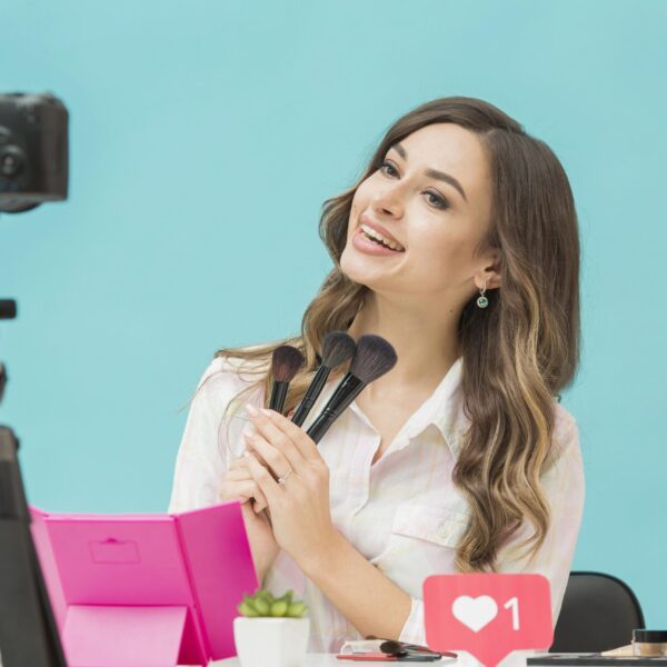 beautiful-woman-recording-make-up-video